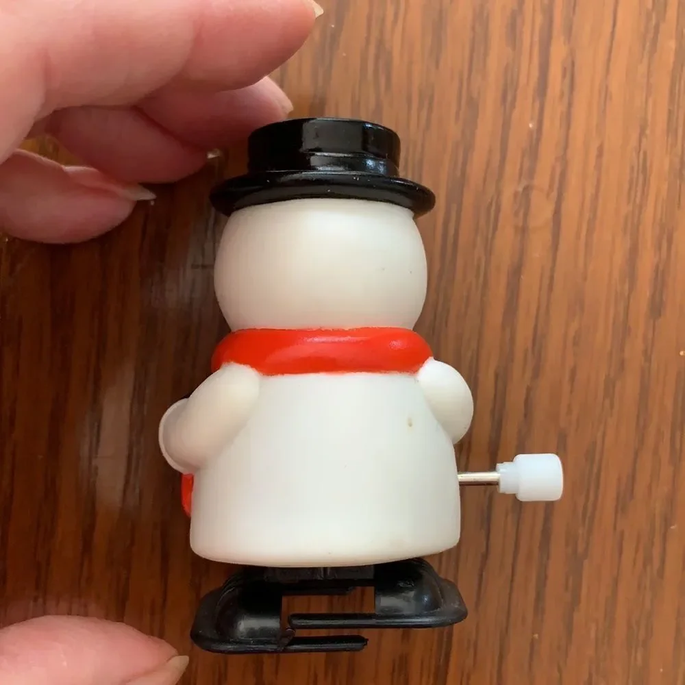 2 plastic wind up Christmas snowmen‎